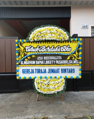 Papan Bunga Duka di Batang Tuaka